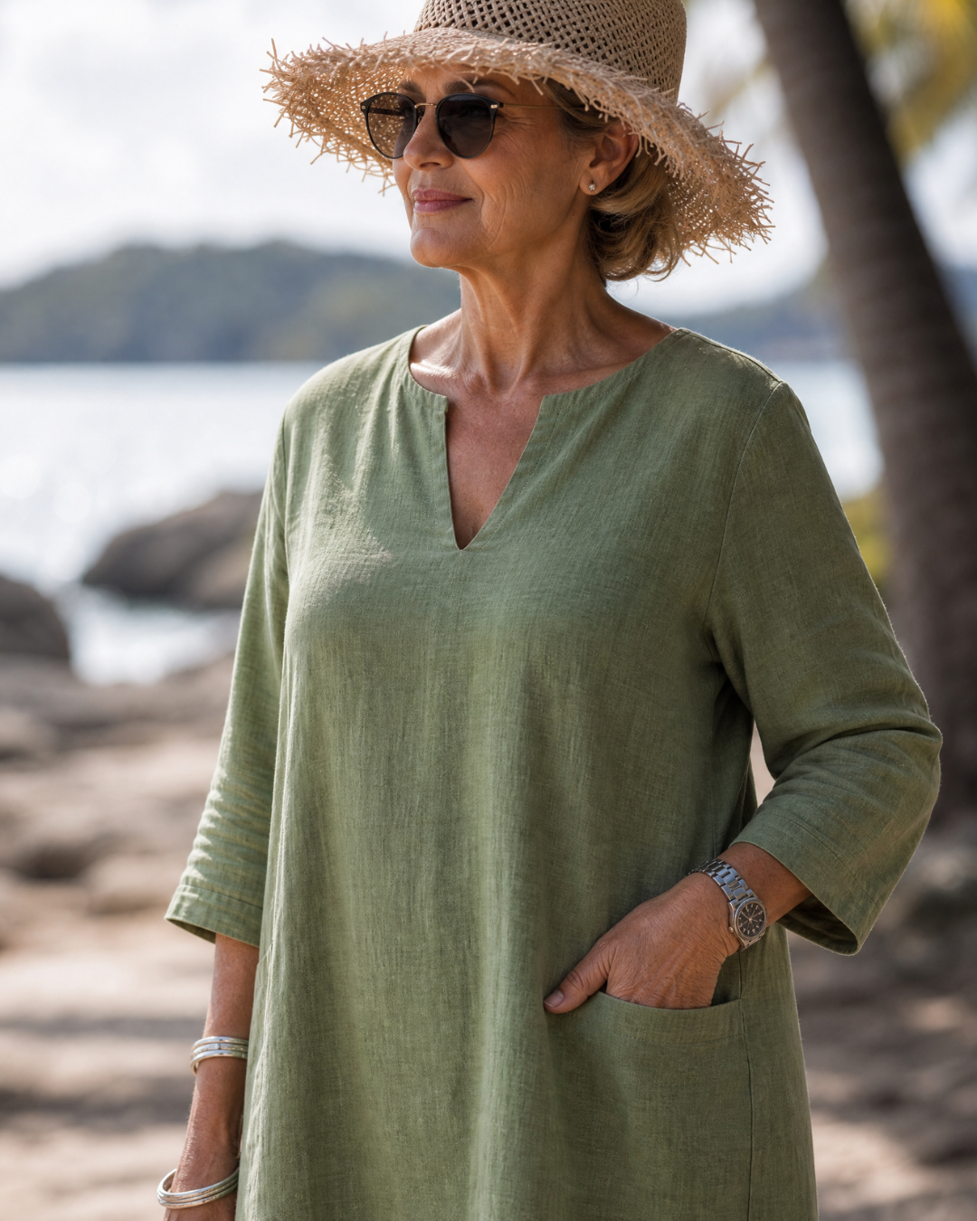 Laendra | Textured V Neck Three Quarter Sleeve Knee Length Dress