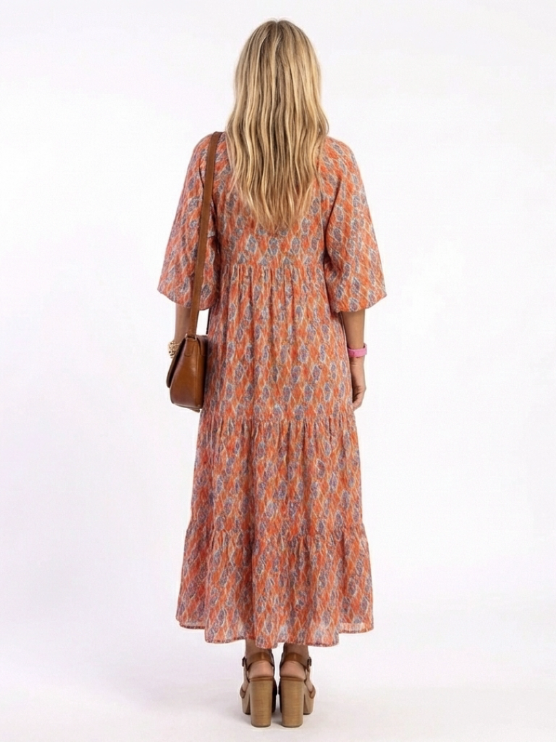 Cornia | Geometric Print V Neck Tiered Midi Dress