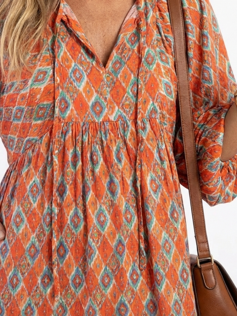 Cornia | Geometric Print V Neck Tiered Midi Dress