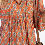 Cornia | Geometric Print V Neck Tiered Midi Dress