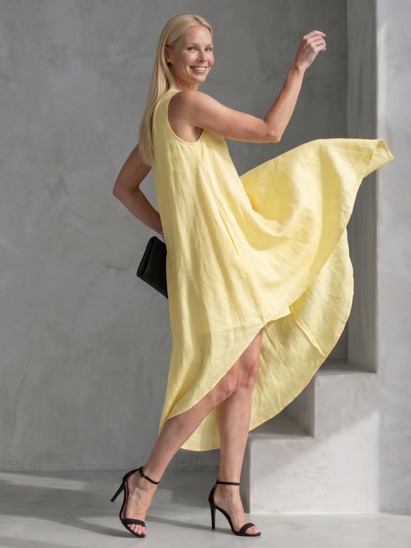 Talnia | Sleeveless High Low Flowing Shape Midi Dress